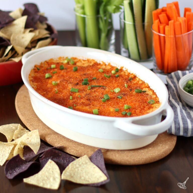 Buffalo Chicken Dip in a white baking dish.
