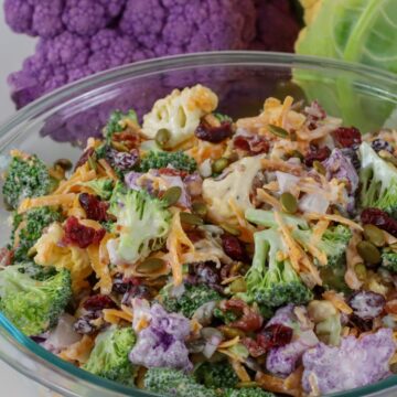 This image shows a Broccoli and Cauliflower Salad in a bowl.
