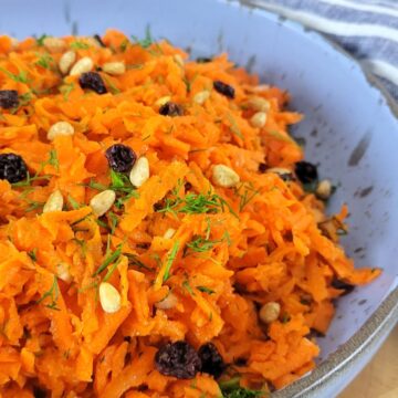 This is an image of a bowl containing Raw Carrot Salad.