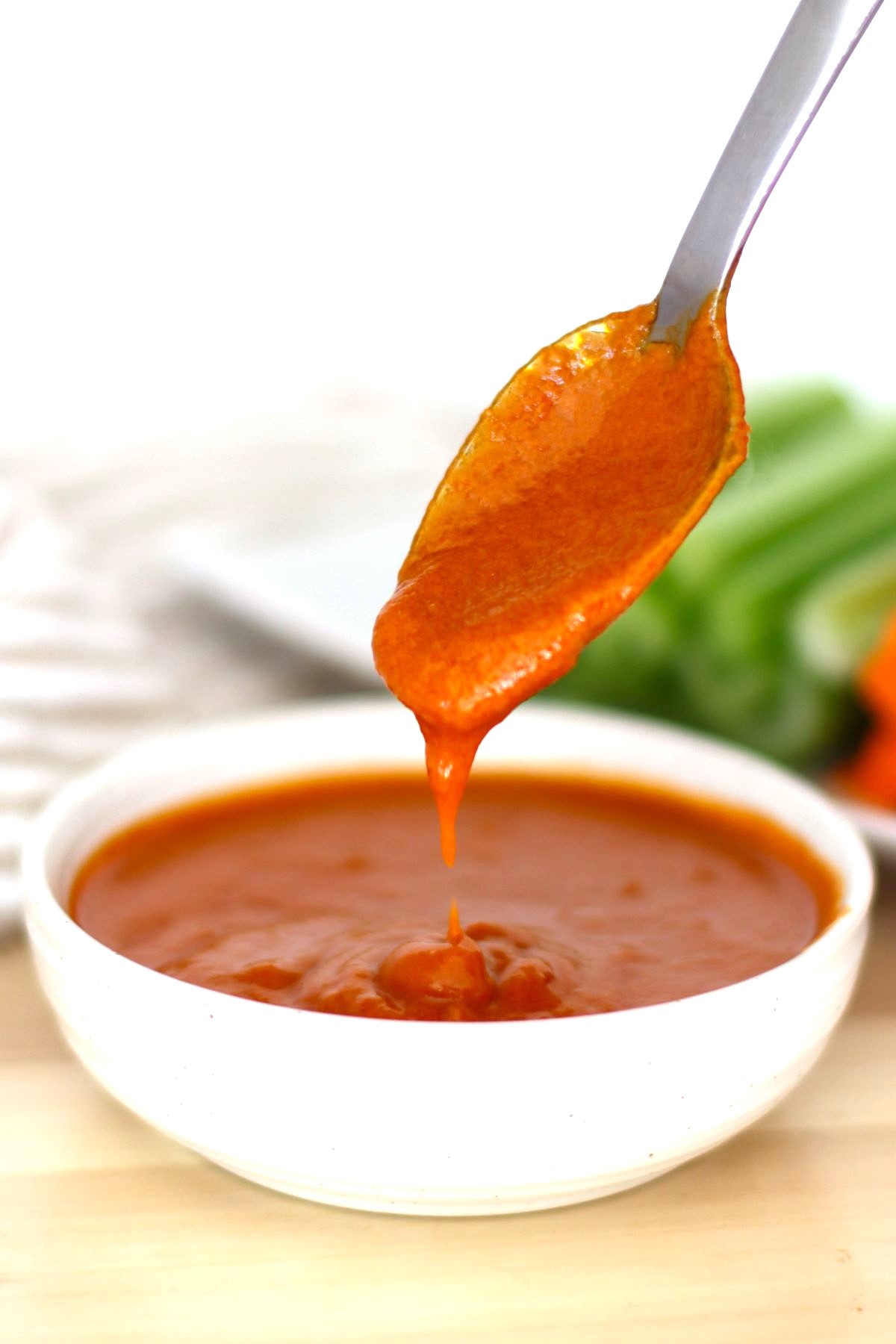 Mild Buffalo Sauce with a spoonful of the sauce. 