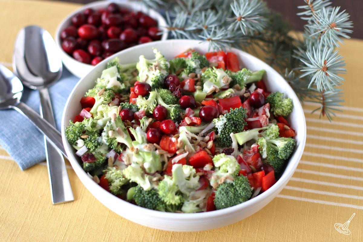 Broccoli Salad with Cranberries and sunflower seeds in a serving bowl. 