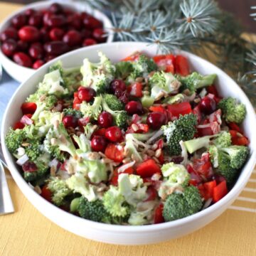 Broccoli Salad with Cranberries and sunflower seeds in a bowl.