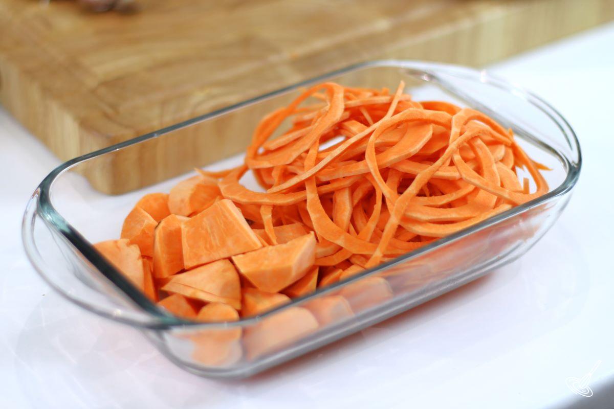 Pieces of peeled sweet potato in a clear dish. 