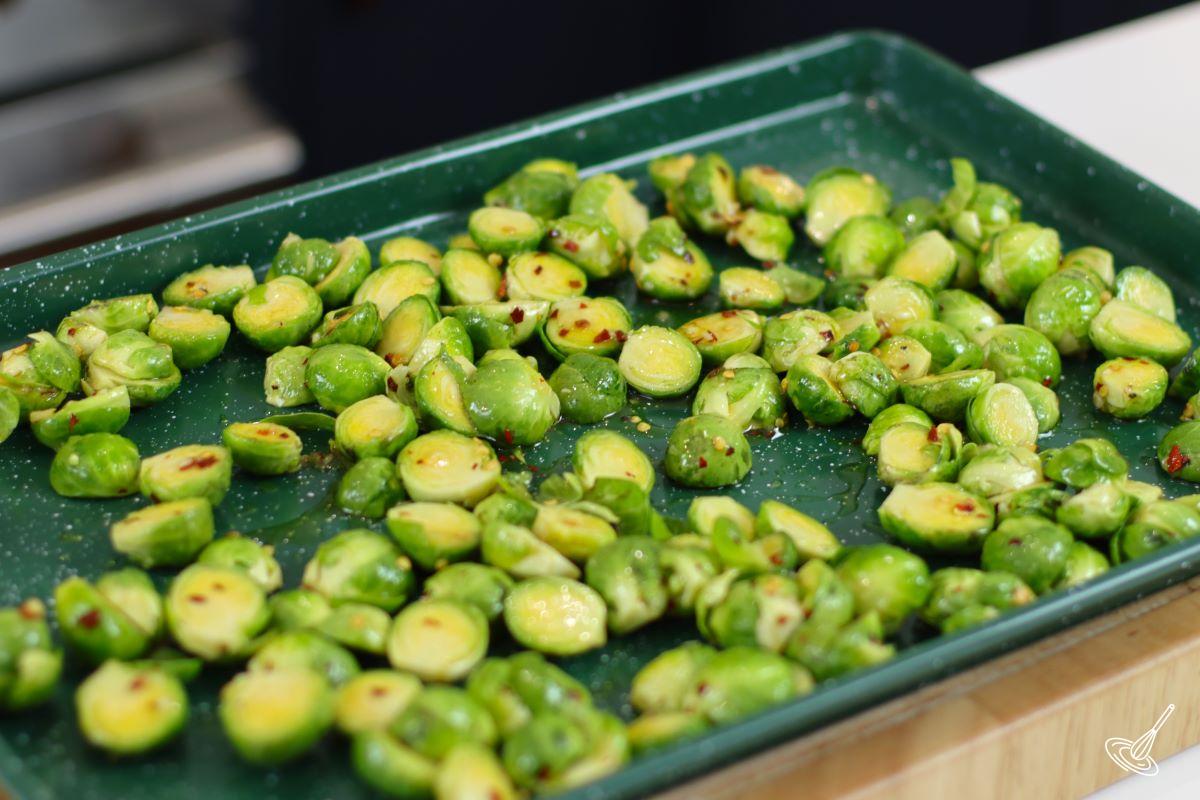 Coated brussels sprouts before going into the oven. 