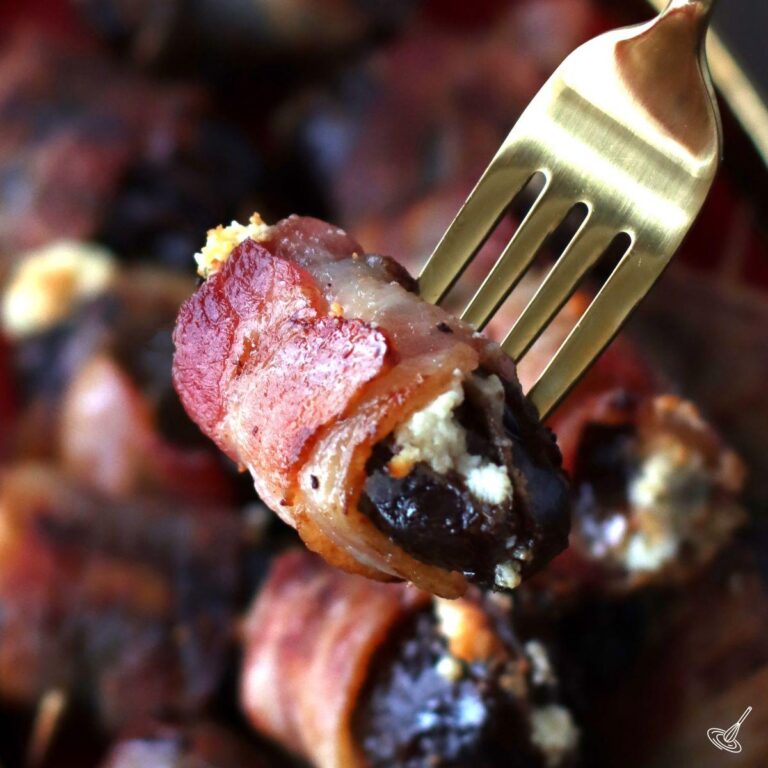 Dates Stuffed with Goat Cheese on a fork.