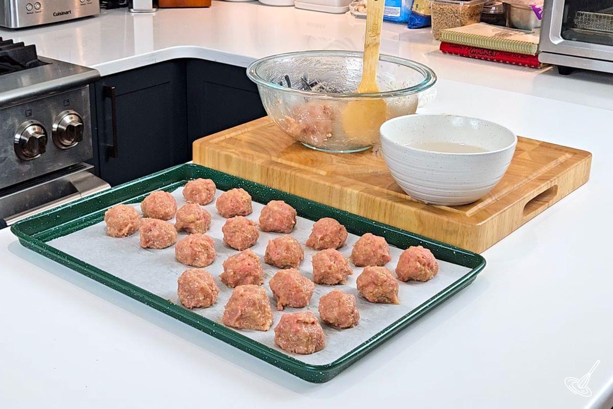 Buffalo Turkey Meatballs on a baking tray.