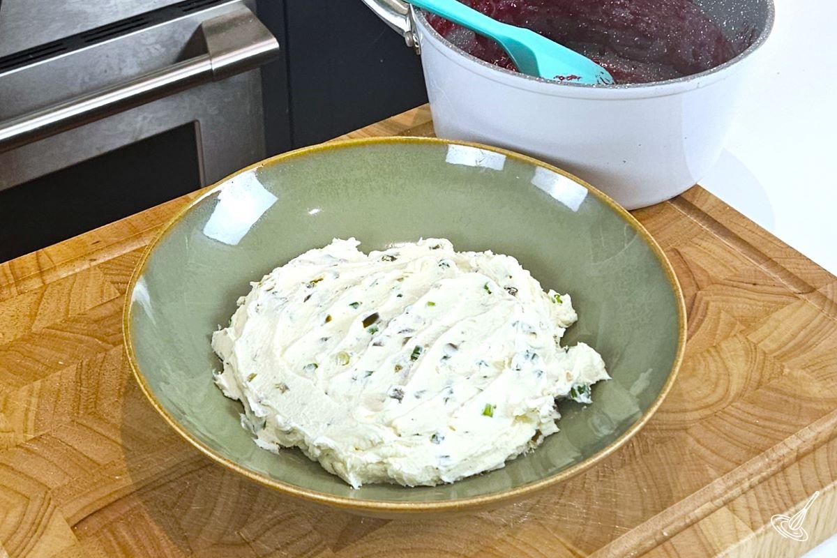 A cream cheese jalapeno spread in a bowl.