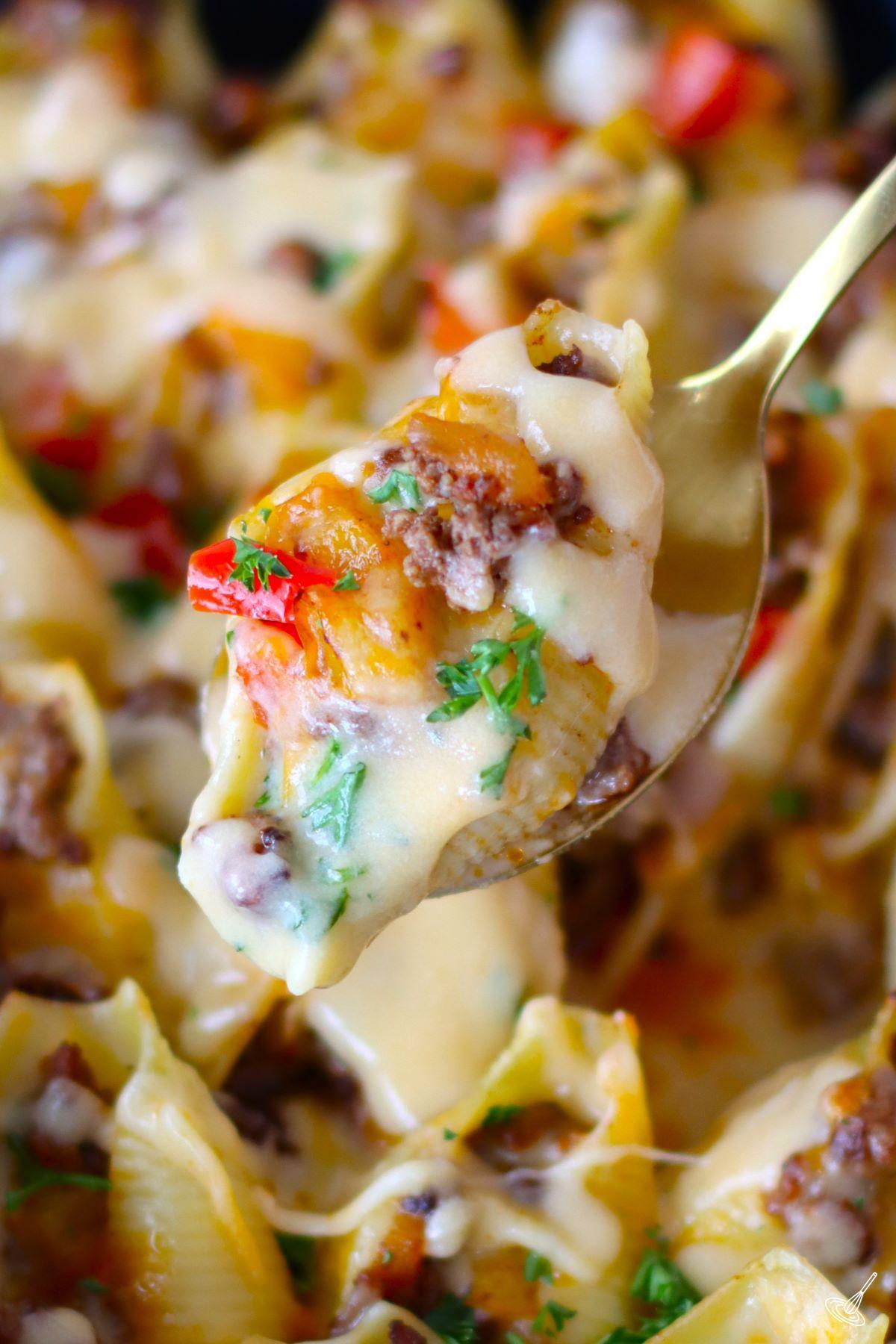 A spoonful of Philly Cheesesteak Stuffed Shells.