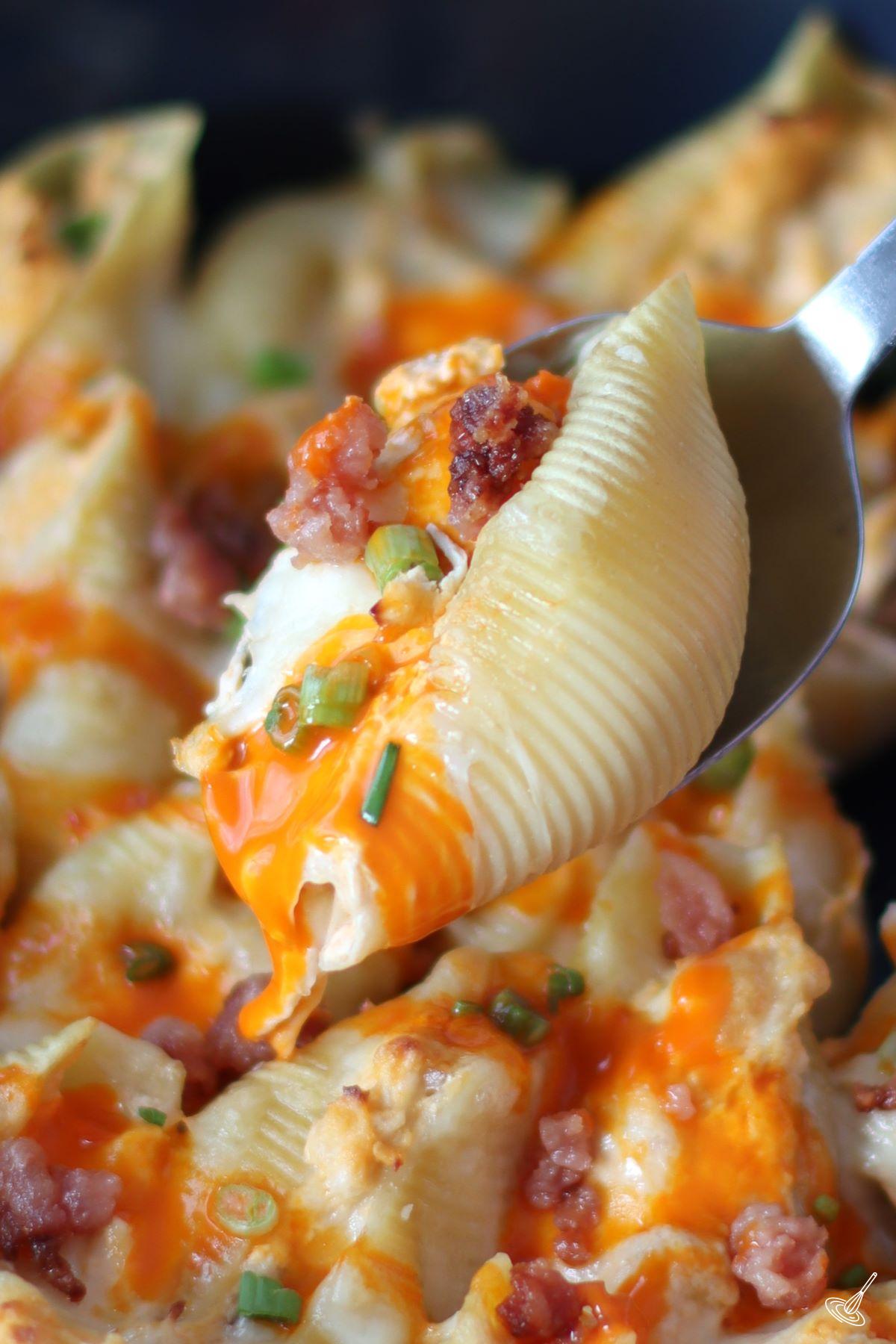 Buffalo Chicken Stuffed Shells on a spoon.