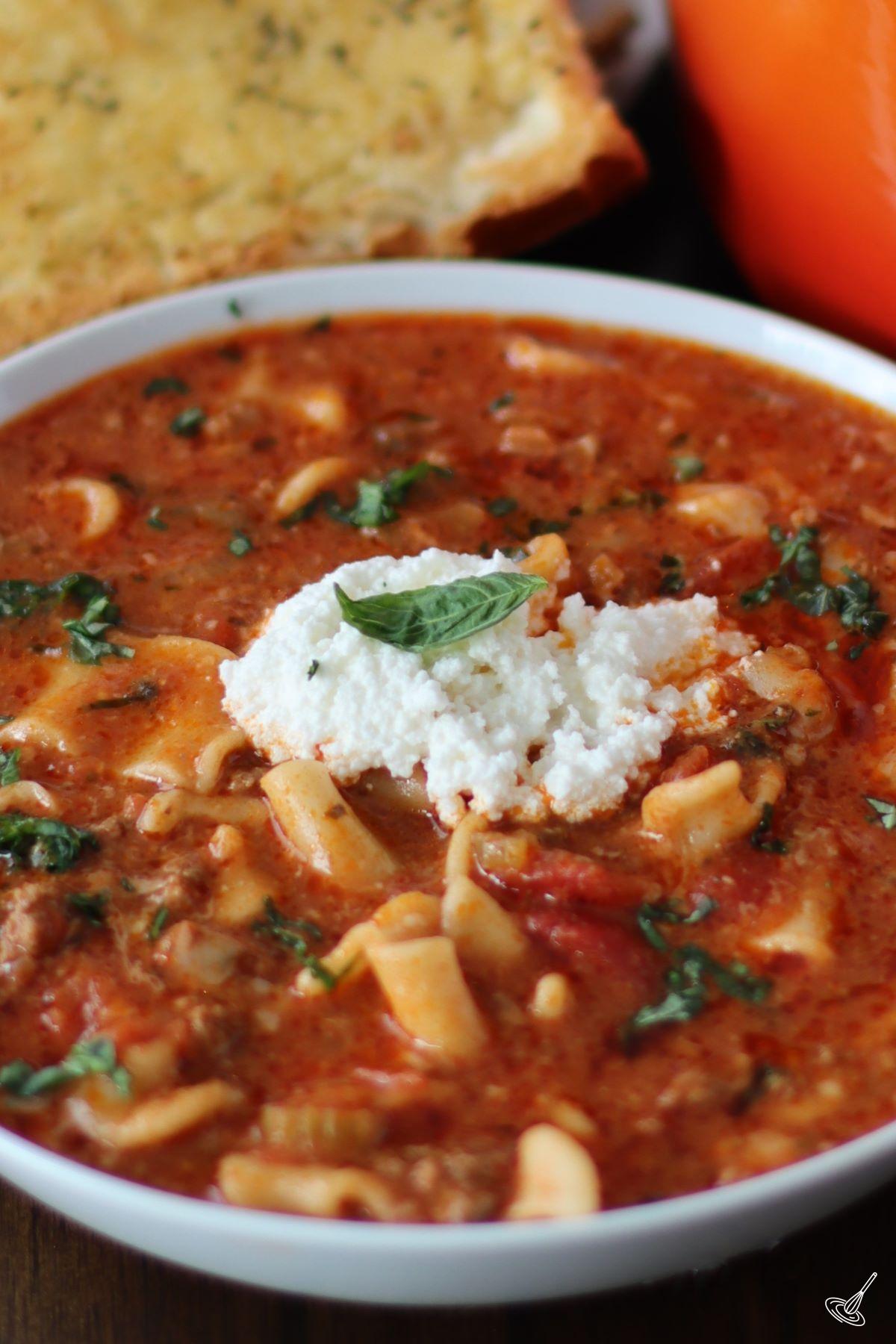 A close up shot of a bowl of One Pot Lasagna Soup.