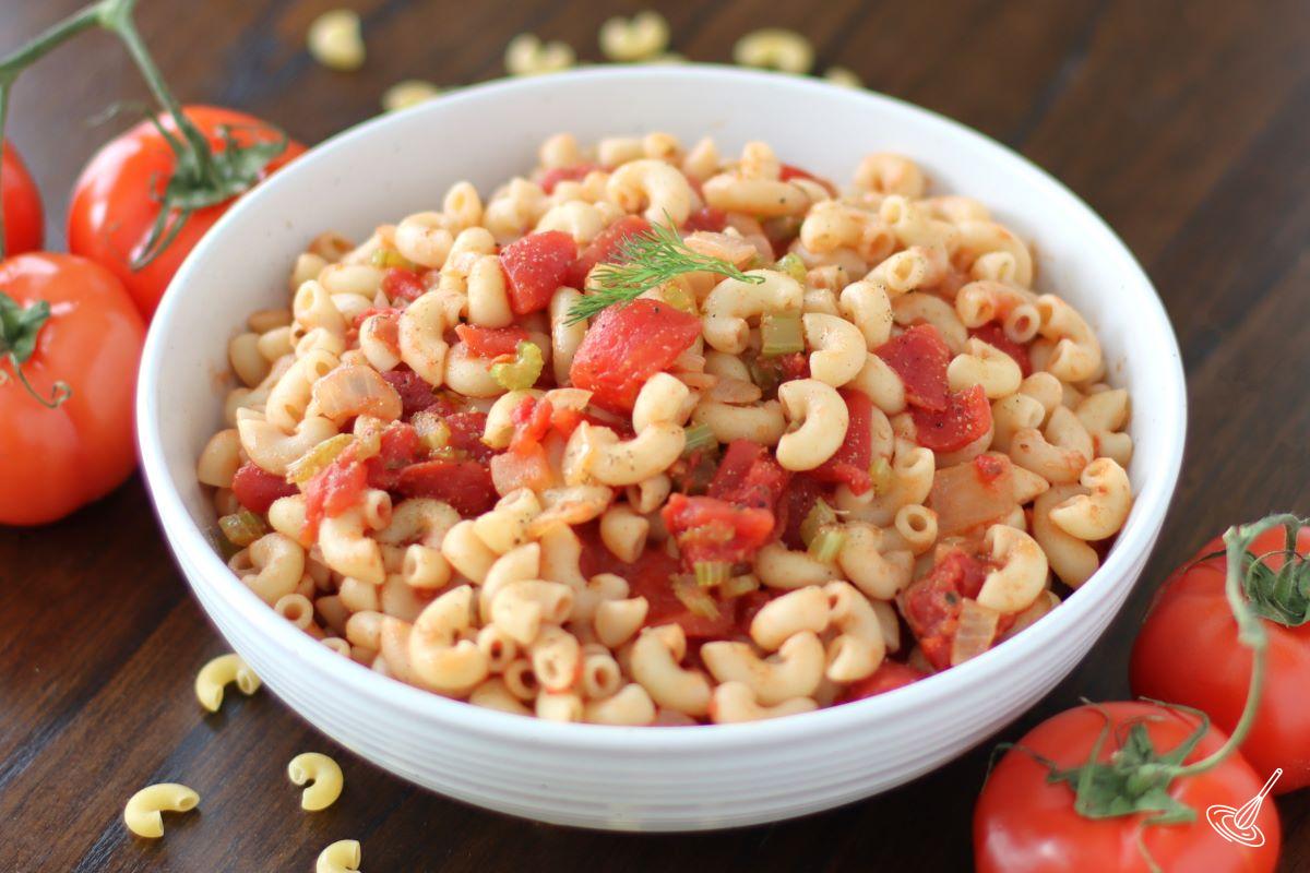 Macaroni and Tomatoes Recipe in a serving bowl. 