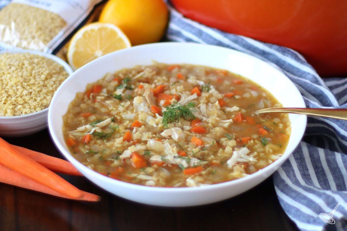 A large white bowl containing Chicken Pastina Soup.