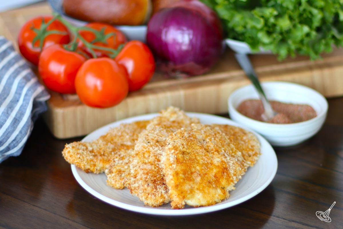 Crispy Cajon Chicken cutlets on a plate.