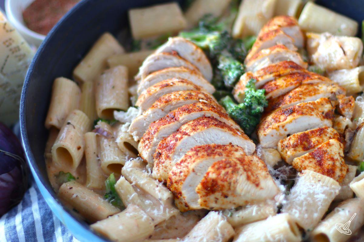 Cajun Chicken and Broccoli Alfredo in a large skillet.