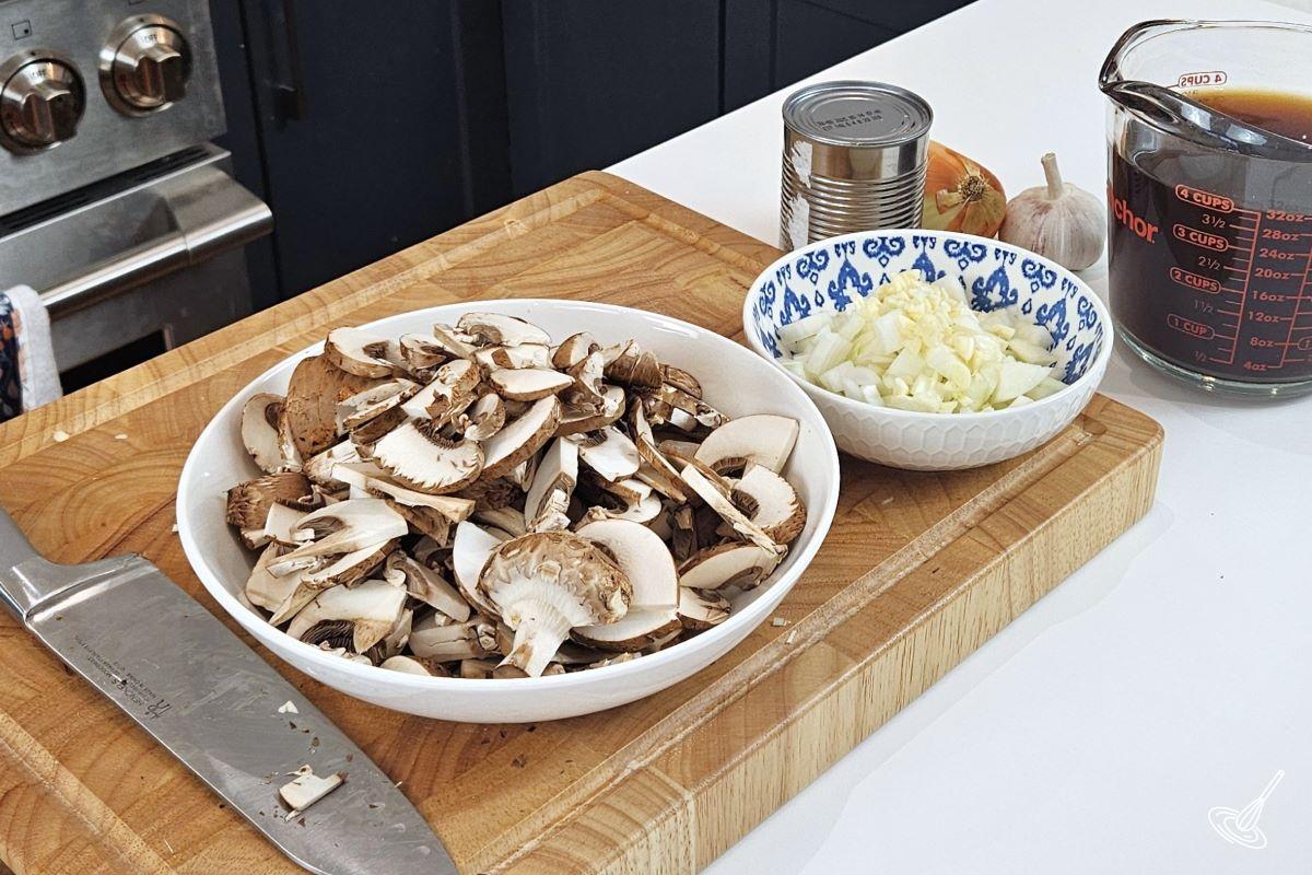 Sliced mushrooms in a bowl.
