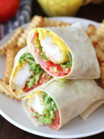 Honey Mustard Chicken Wraps on a plate with fries.