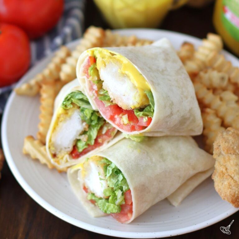 Honey Mustard Chicken Wraps on a plate with fries.