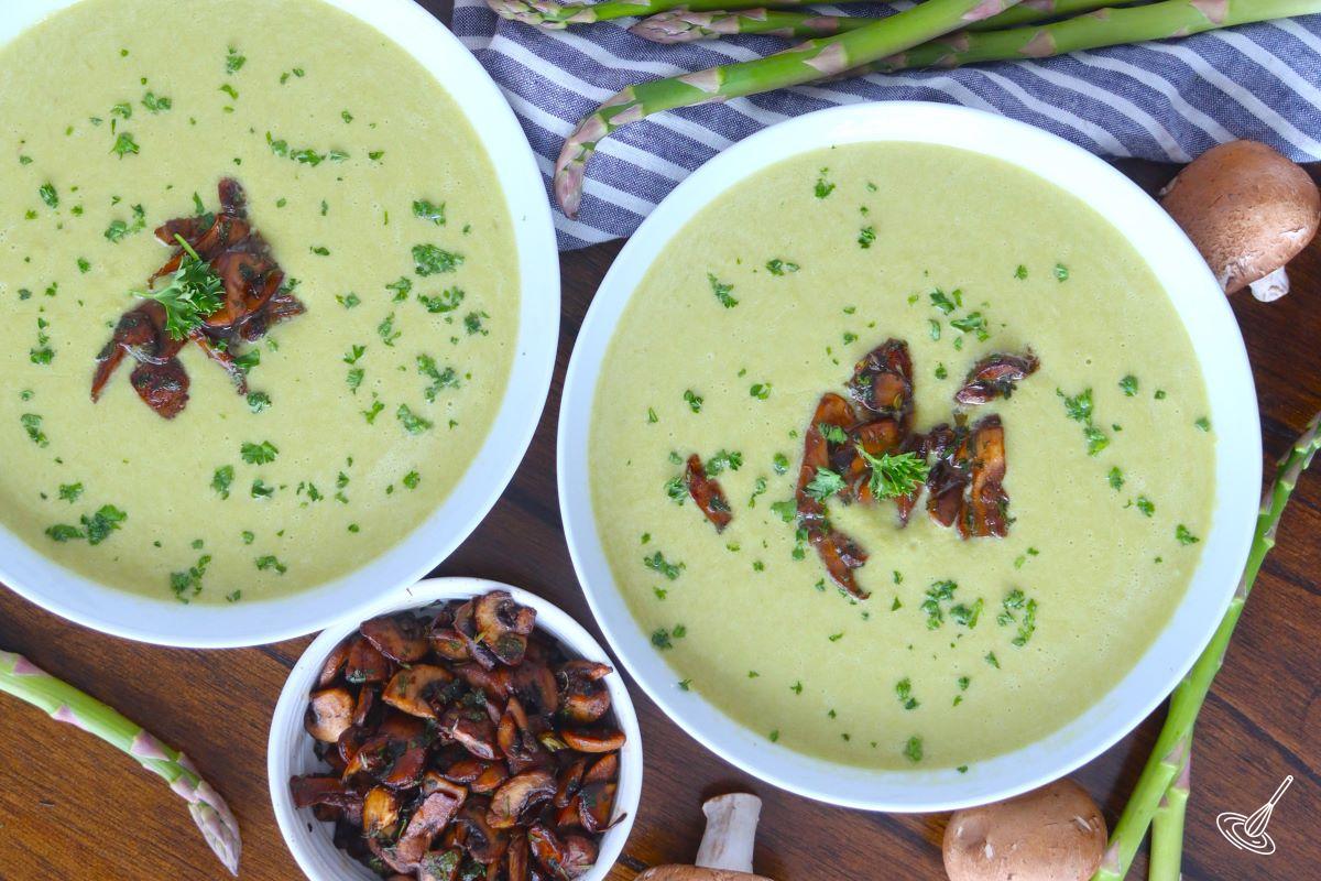 Asparagus Mushroom Soup garnished with fresh parsley and fried mushrooms. 