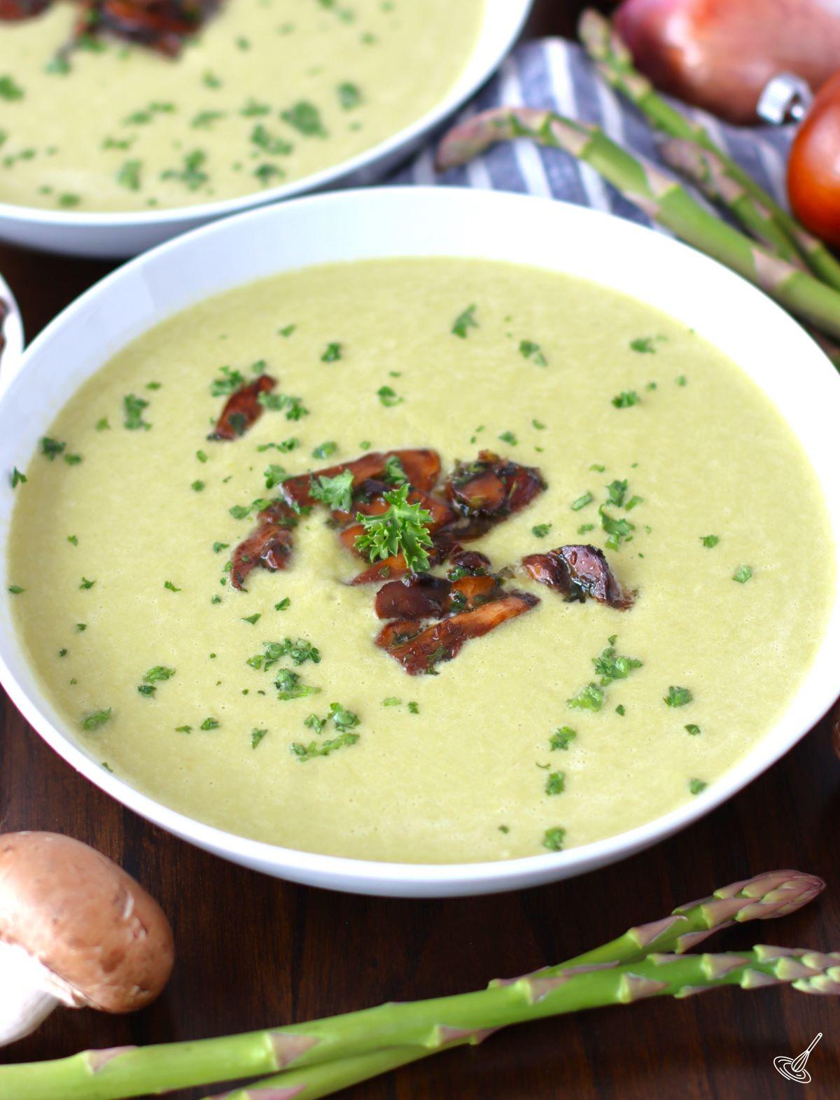 Asparagus Mushroom Soup served in a white bowl.