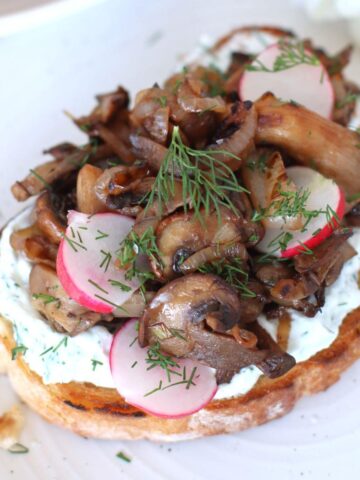 Mushroom Tartine on a plate.