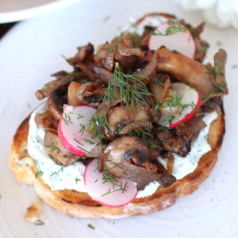 Mushroom Tartine on a plate.