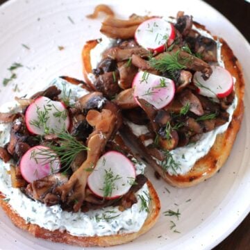 Mushroom Tartine on a plate.