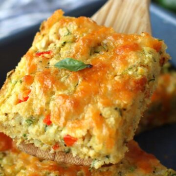 Zucchini Cornbread Casserole portion on a spatula.