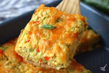 Zucchini Cornbread Casserole portion on a spatula.