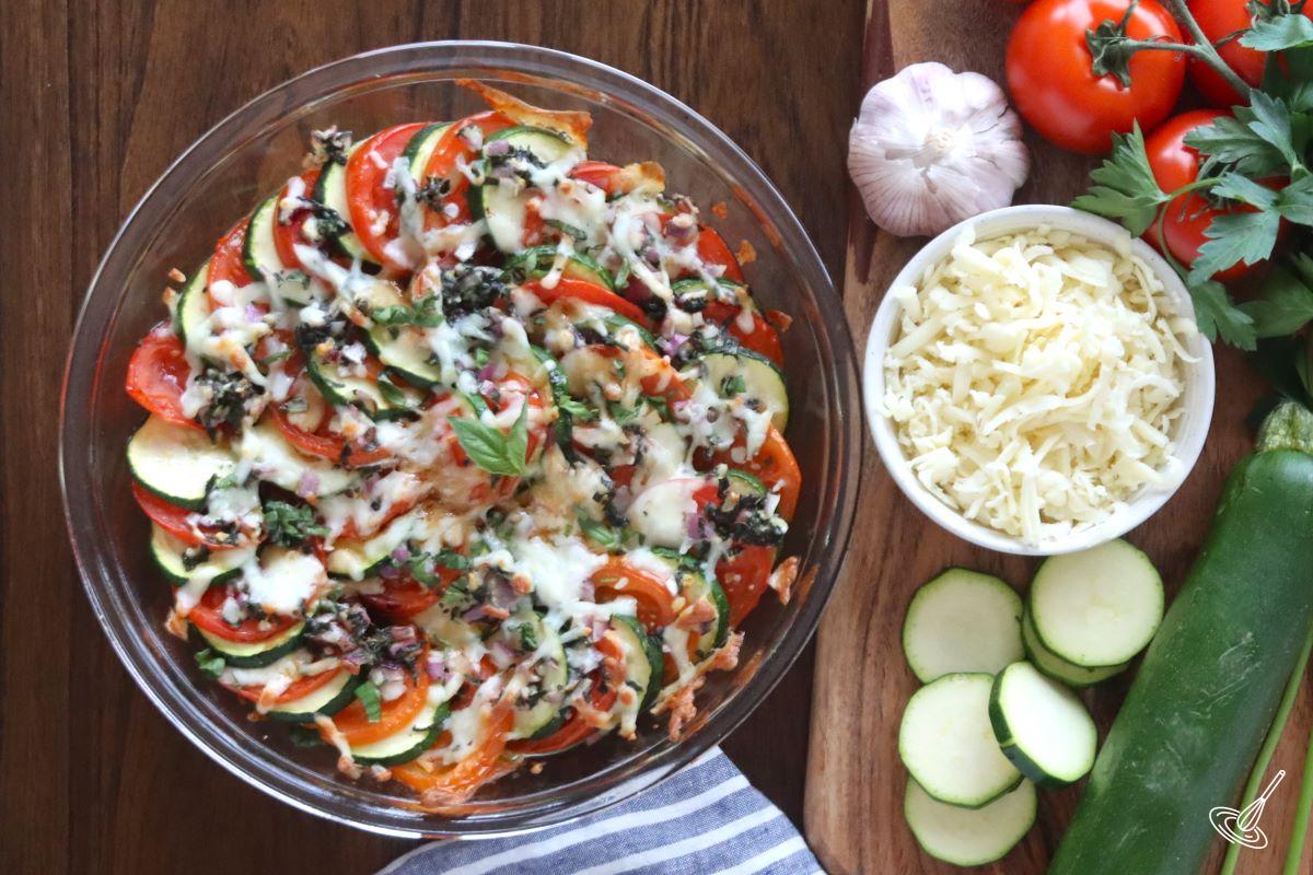 Caprese Zucchini Casserole on a table. 