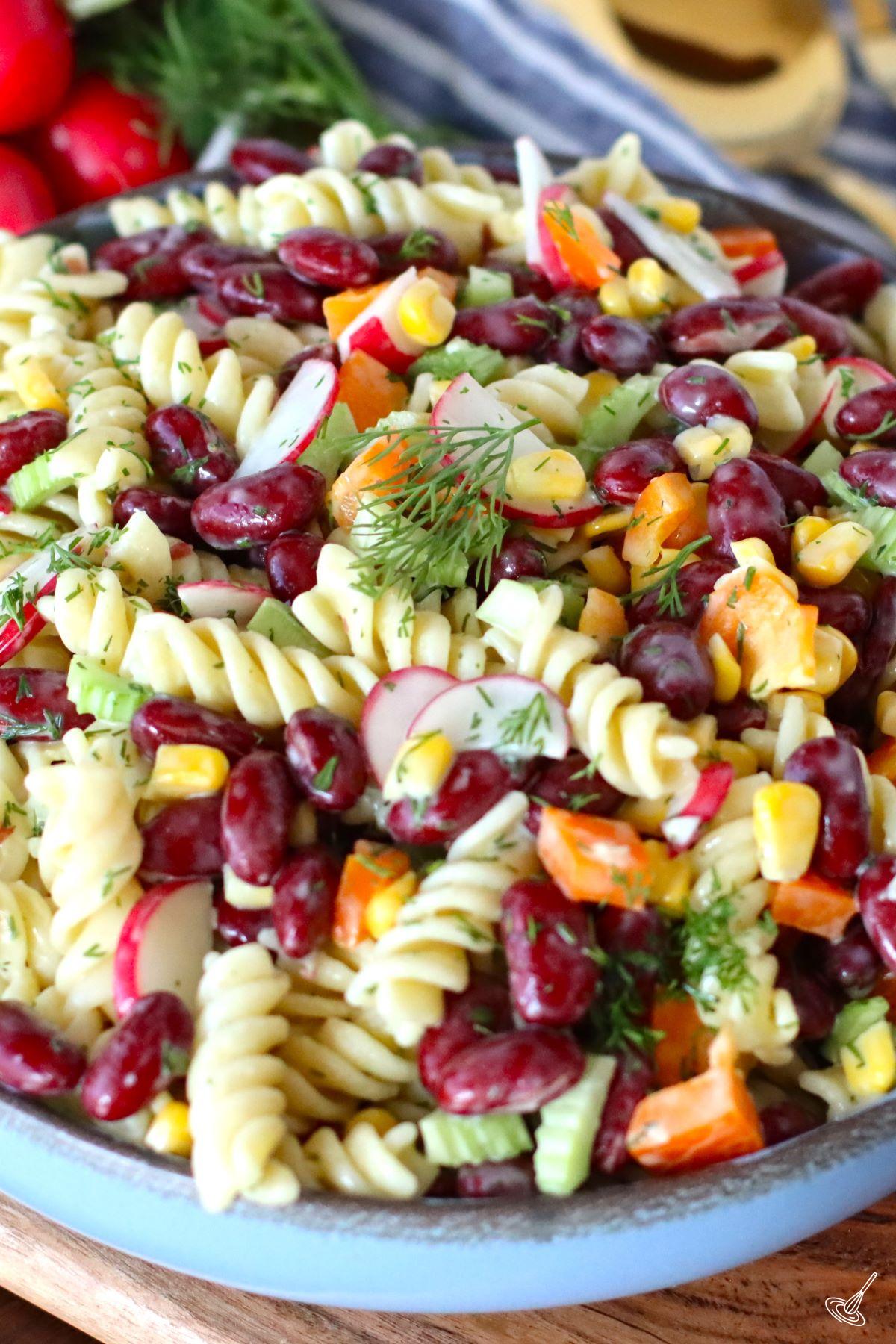 Pasta Salad with Kidney Beans in a serving bowl. 