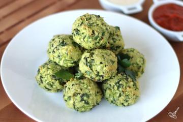 Zucchini Garlic Bites on a white plate.