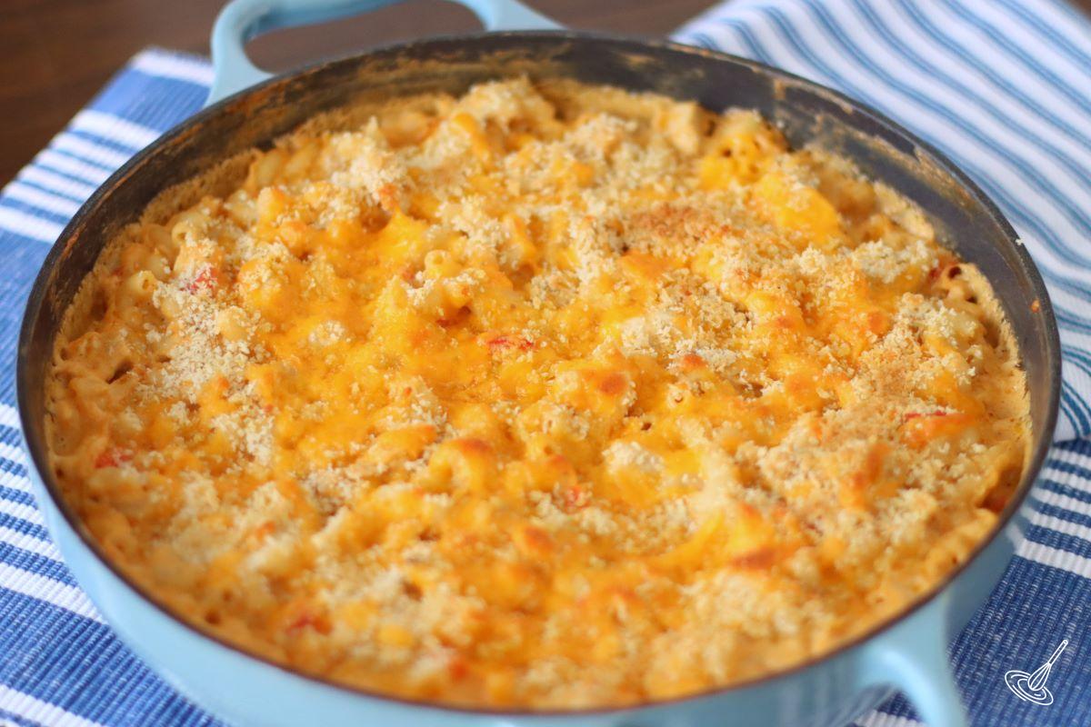 A large skillet of cooked Cajun Chicken Mac and Cheese. 