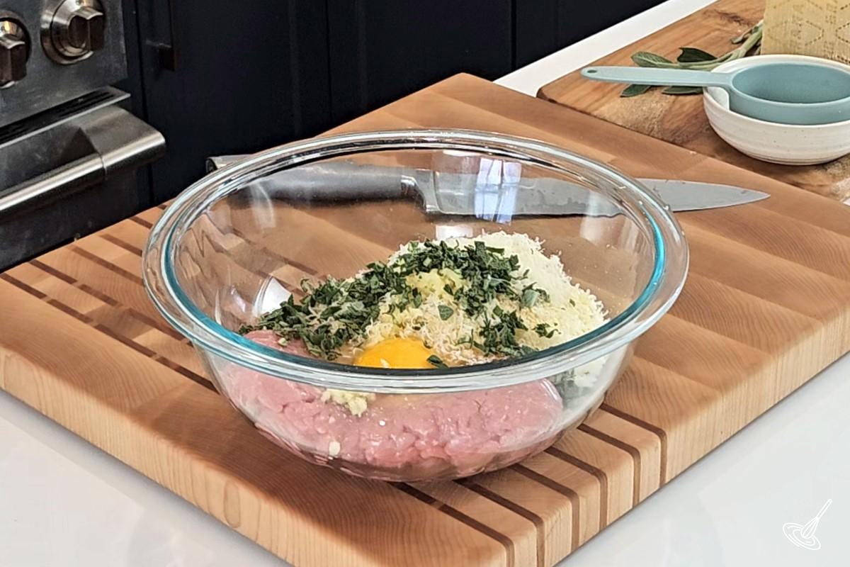 Ground chicken and panko crumbs in a large bowl. 