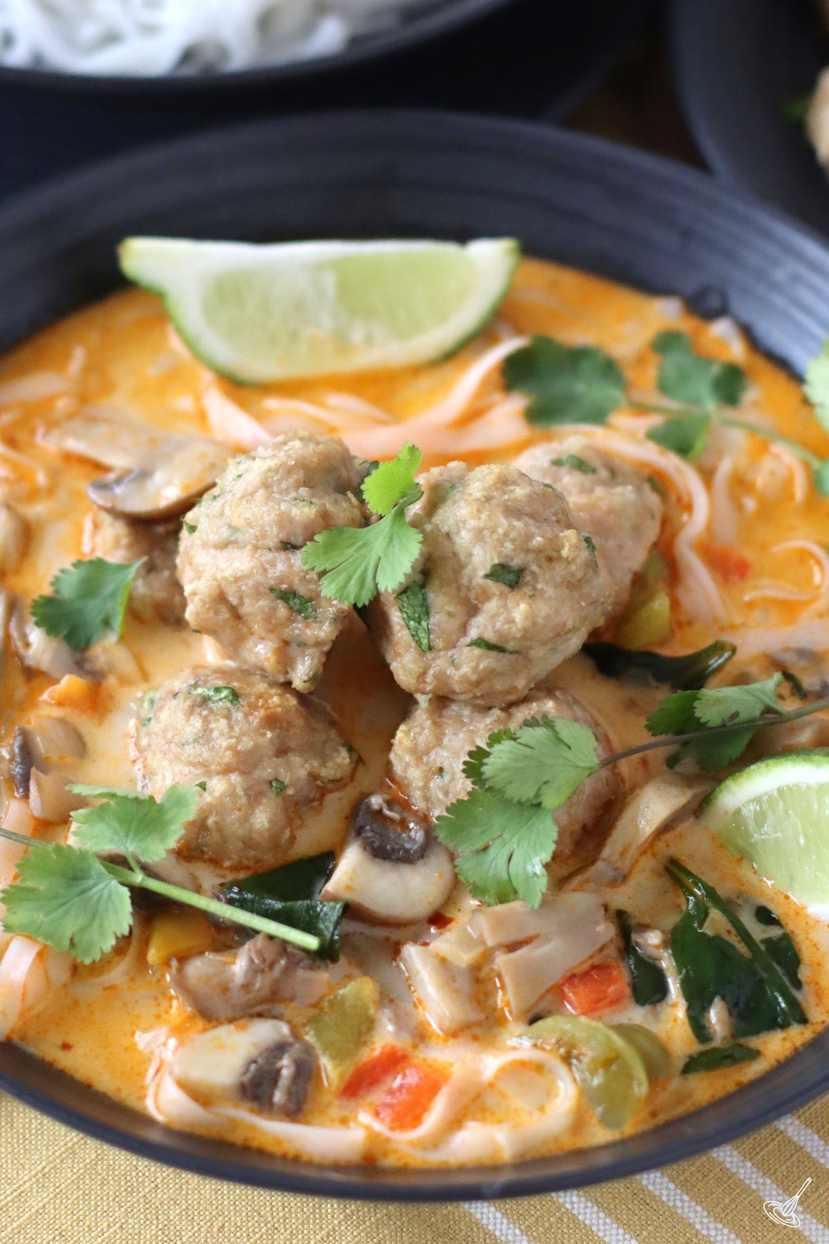 Thai inspired Chicken Meatball Soup in a bowl. 