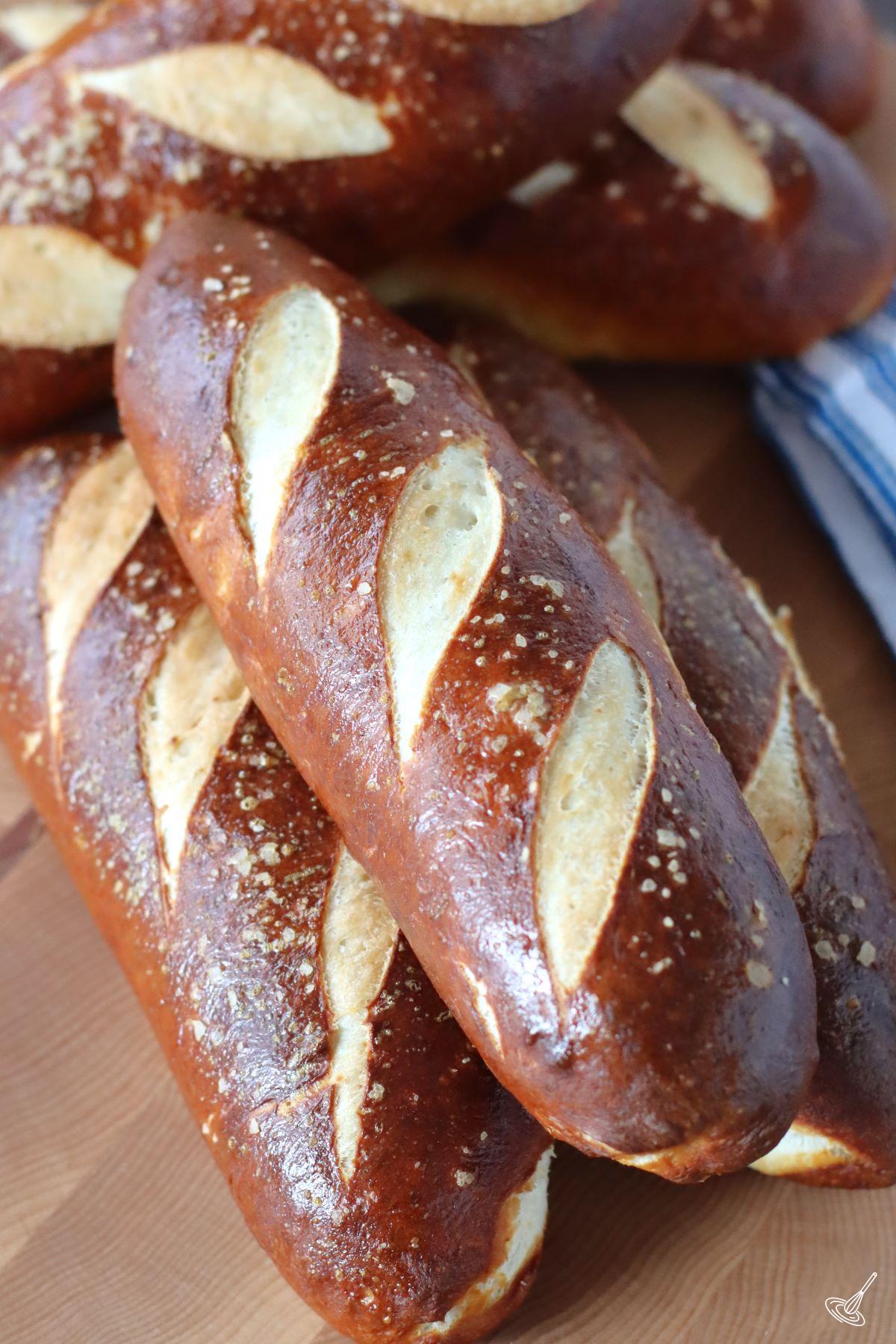 A stack of Pretzel Hot Dog Buns.