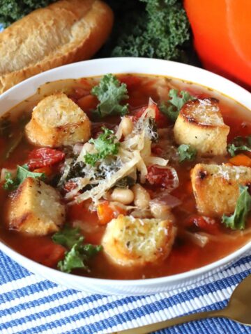 Cabbage and Kale Soup in a white bowl.