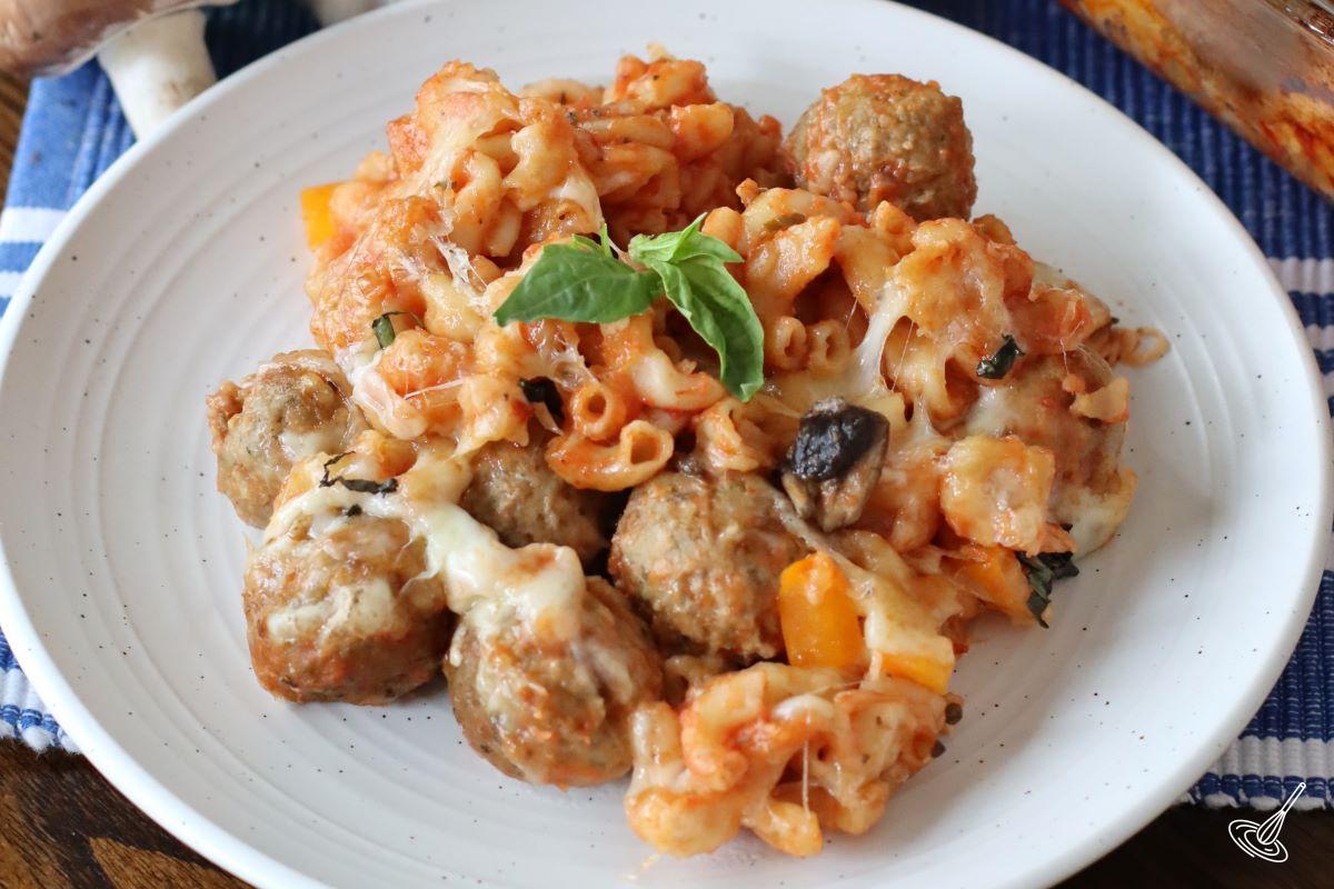 A portion of Dump and Bake Meatball Casserole on a plate. 
