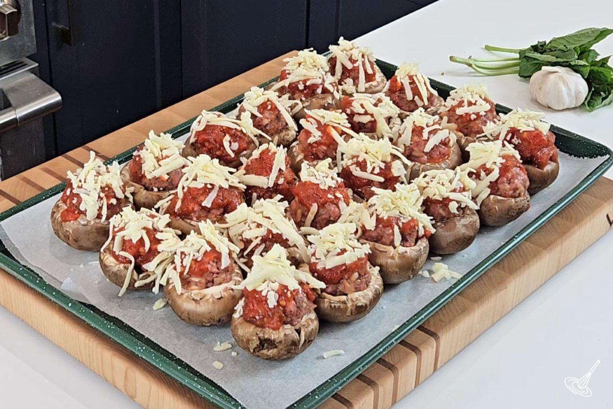 Mushroom stuffed meatballs with grated cheese on top.