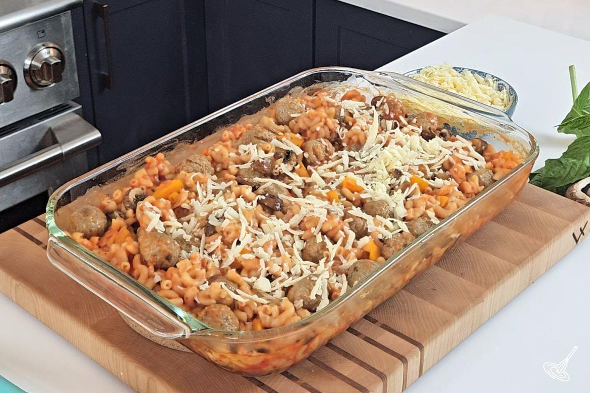 Dump and Bake Meatball Casserole with grated cheese on top. 