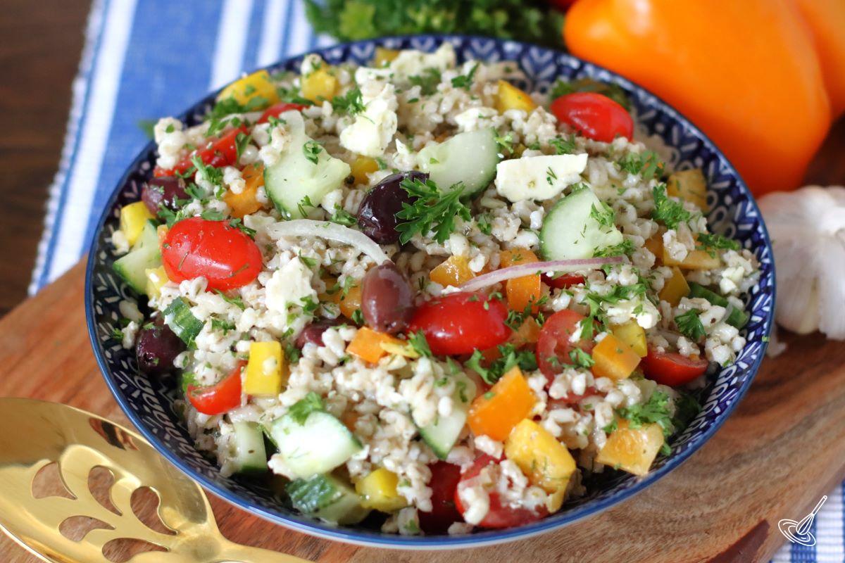 Mediterranean Barley Salad in a serving bowl. 