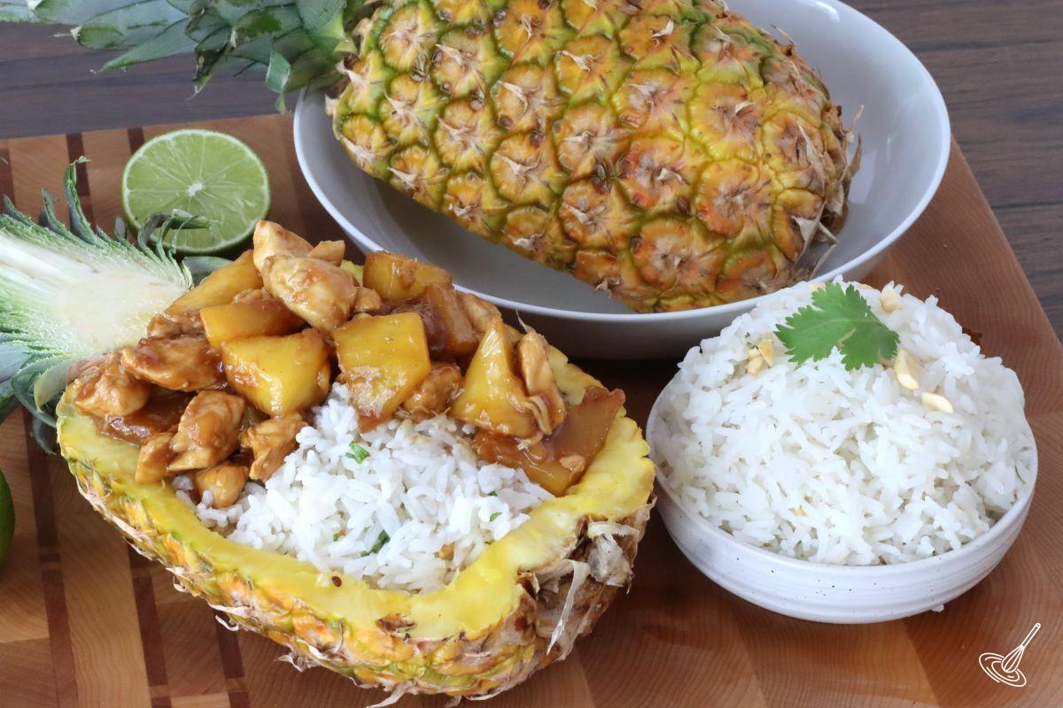 Chicken Teriyaki Pineapple Bowl with a side of coconut rice.