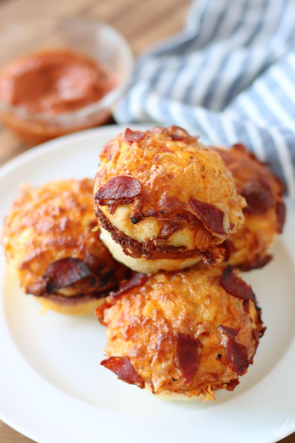 Pizza Muffins on a plate.