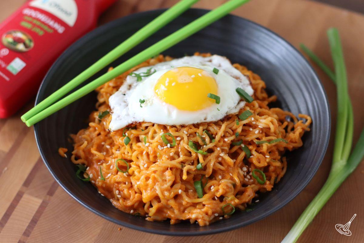 Spicy Cheese Ramen with a sunny side up egg on top. 