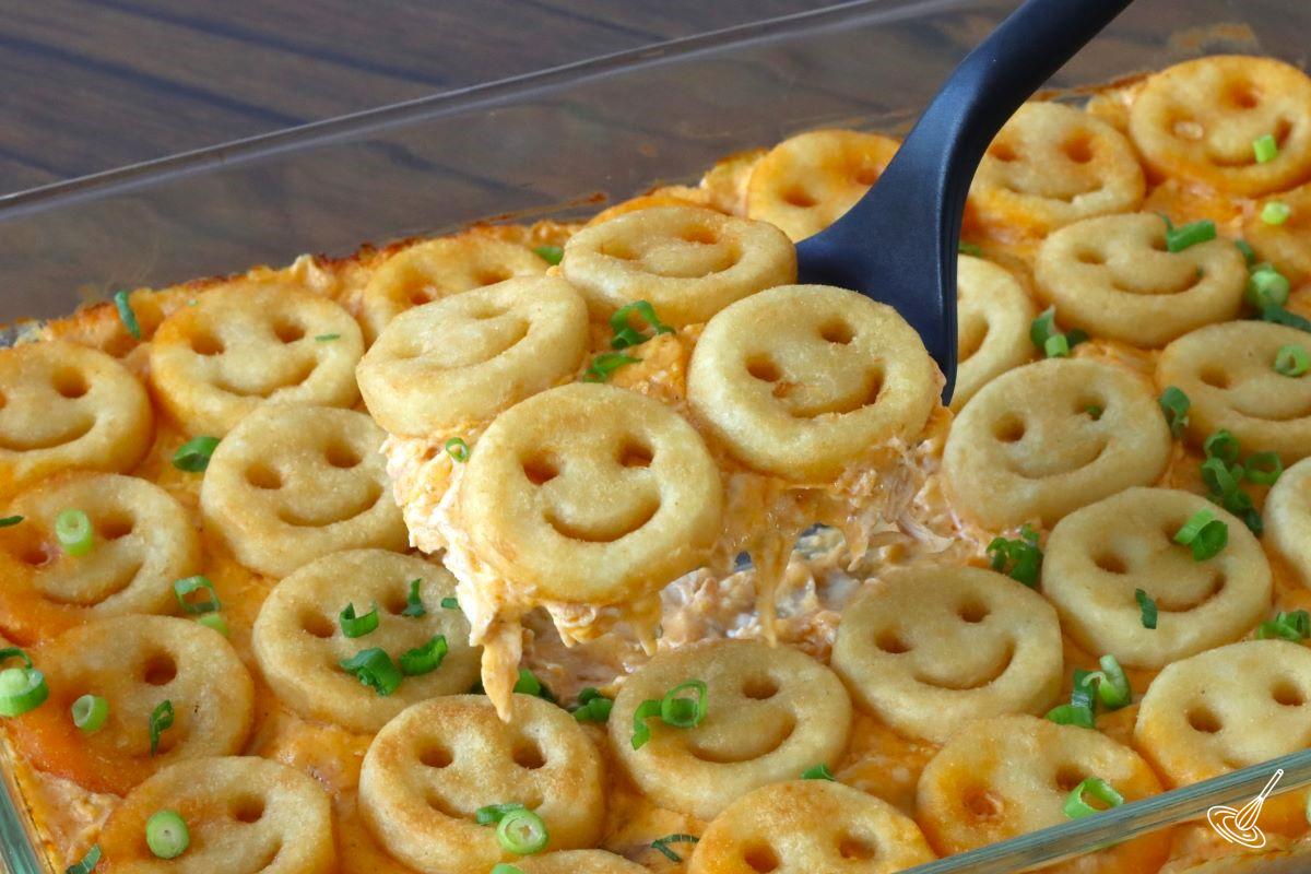 Buffalo Chicken Tater Tot Casserole being served. 