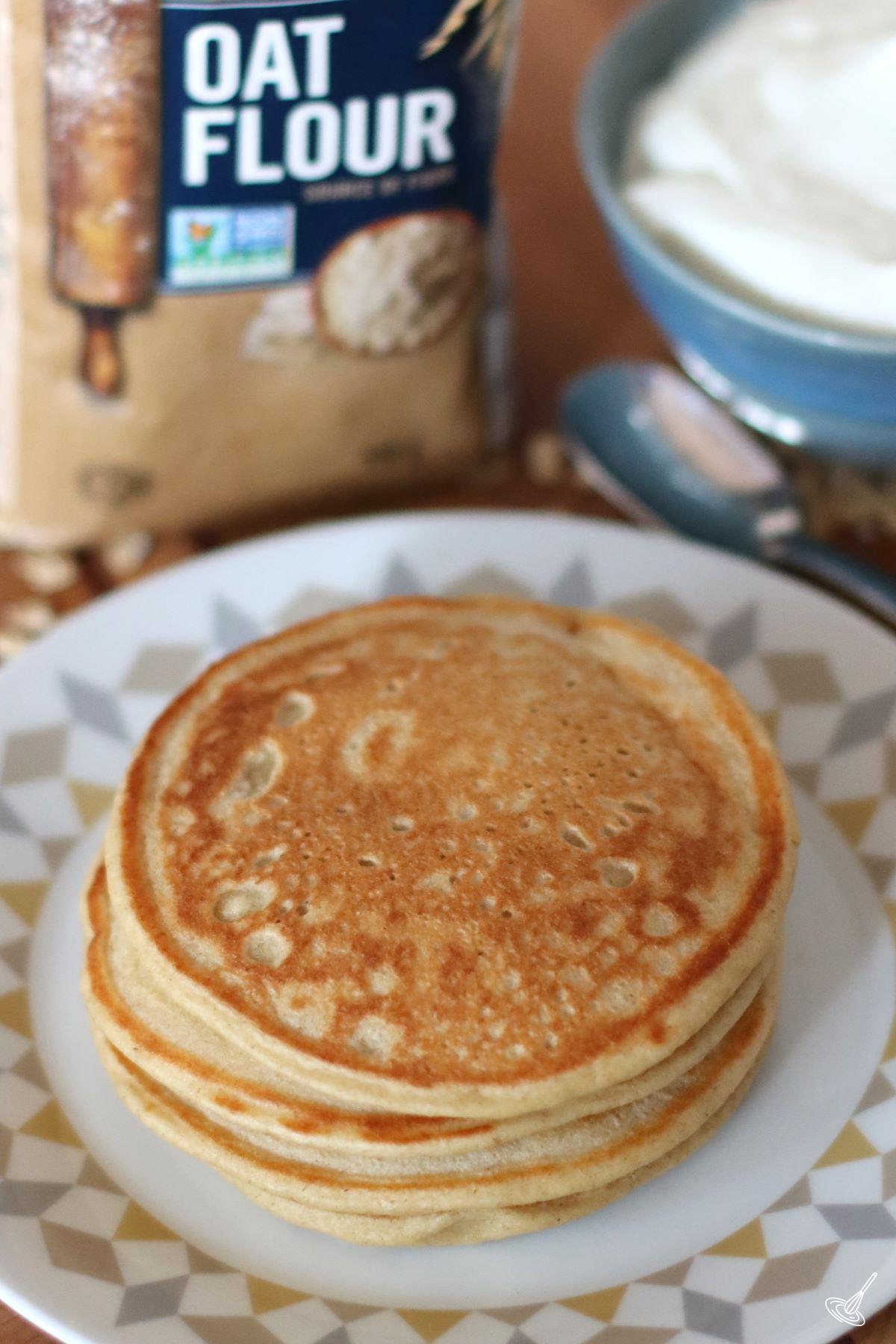 A stack of Greek Yogurt Oatmeal Pancakes on a plate. 