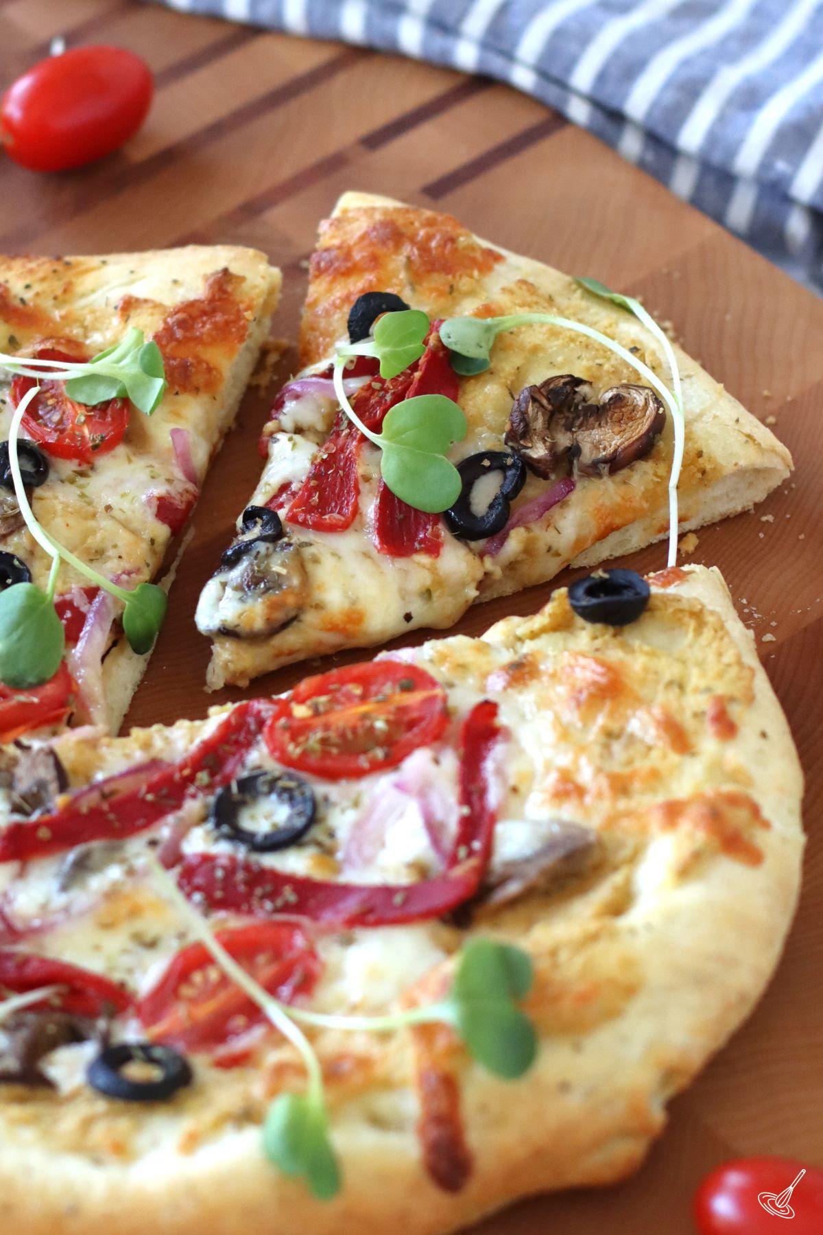 A slice of Hummus Pizza. 