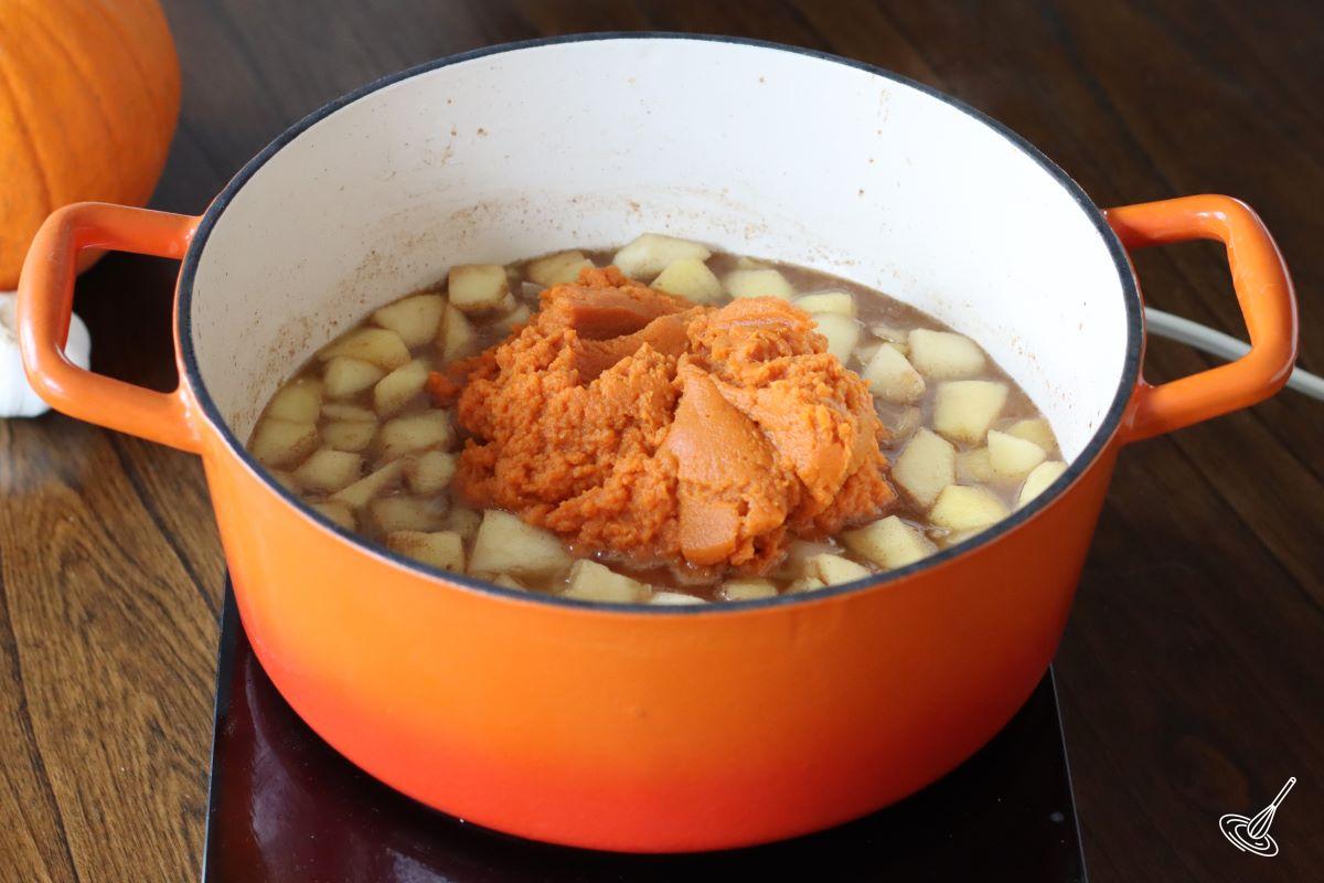 Pumpkin puree added to a soup;.