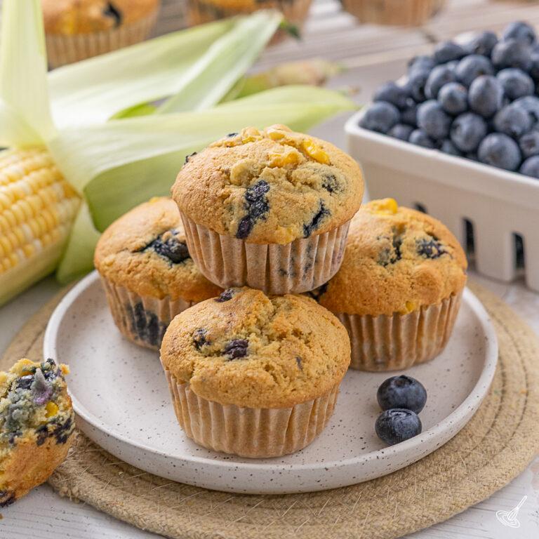 Blueberry Corn Muffins on a plate.