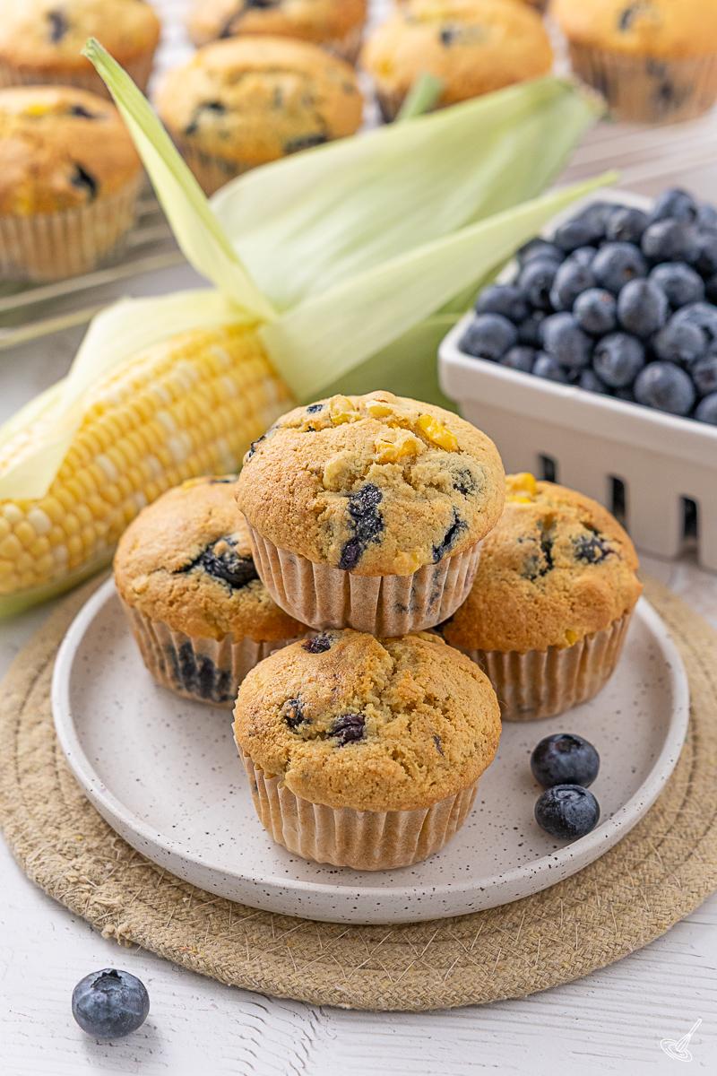 Blueberry Corn Muffins on a plate.