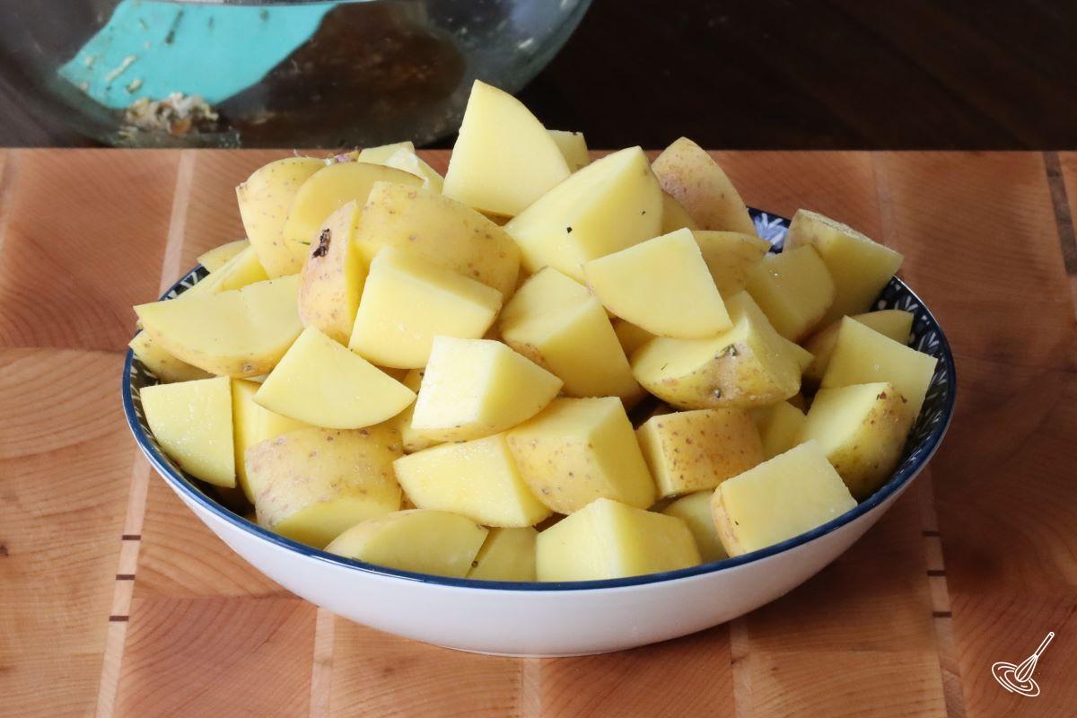 Cubed potatoes in a bowl.